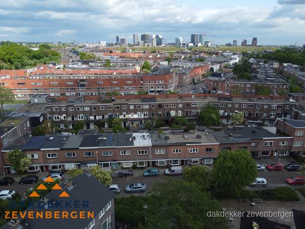 Luchtfoto van daken in woonwijk Zevenbergen Luchtfoto van daken in woonwijk Zevenbergen